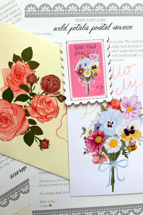 Floral-themed monthly slow mail postcard  and sticker on a textured background.