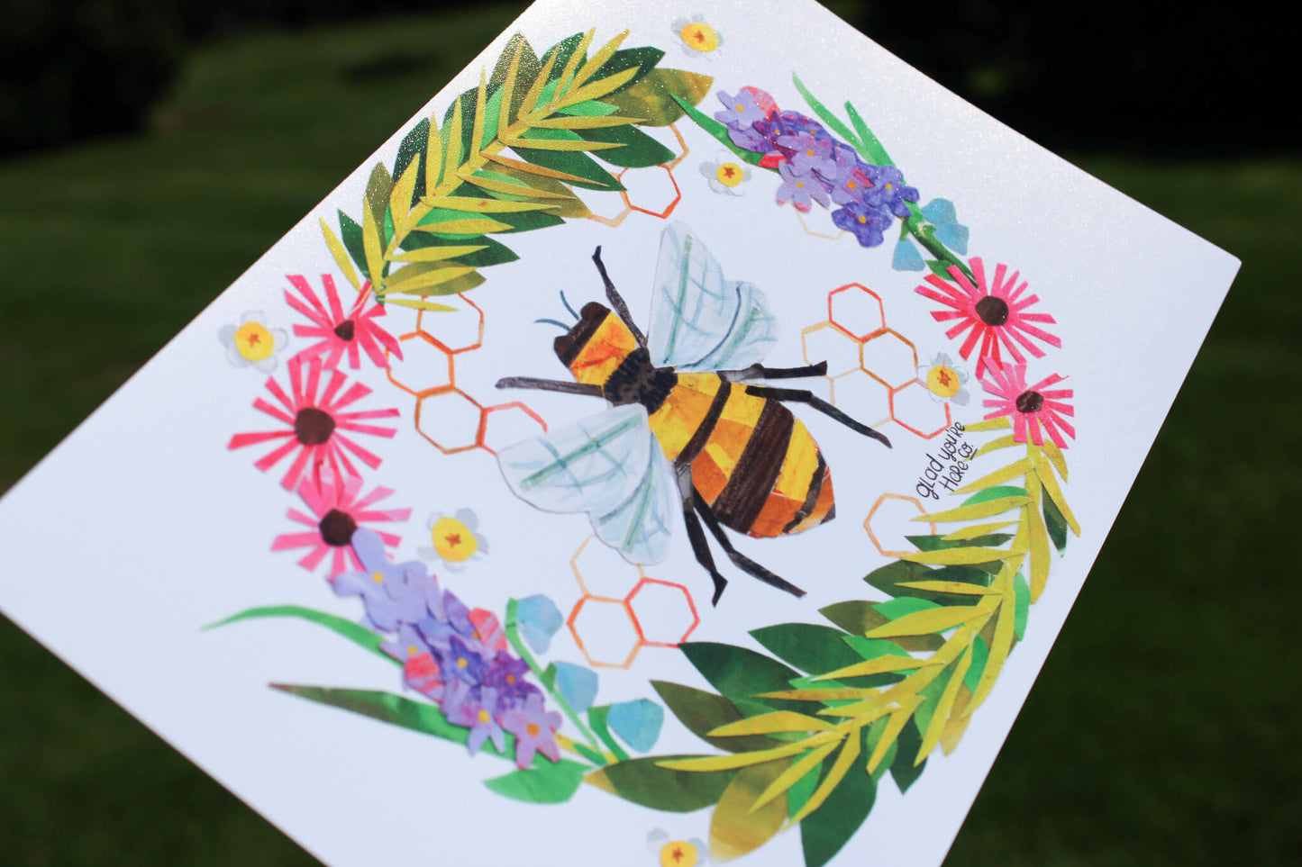 Colorful art print with a mixed media bee and floral design on a white background