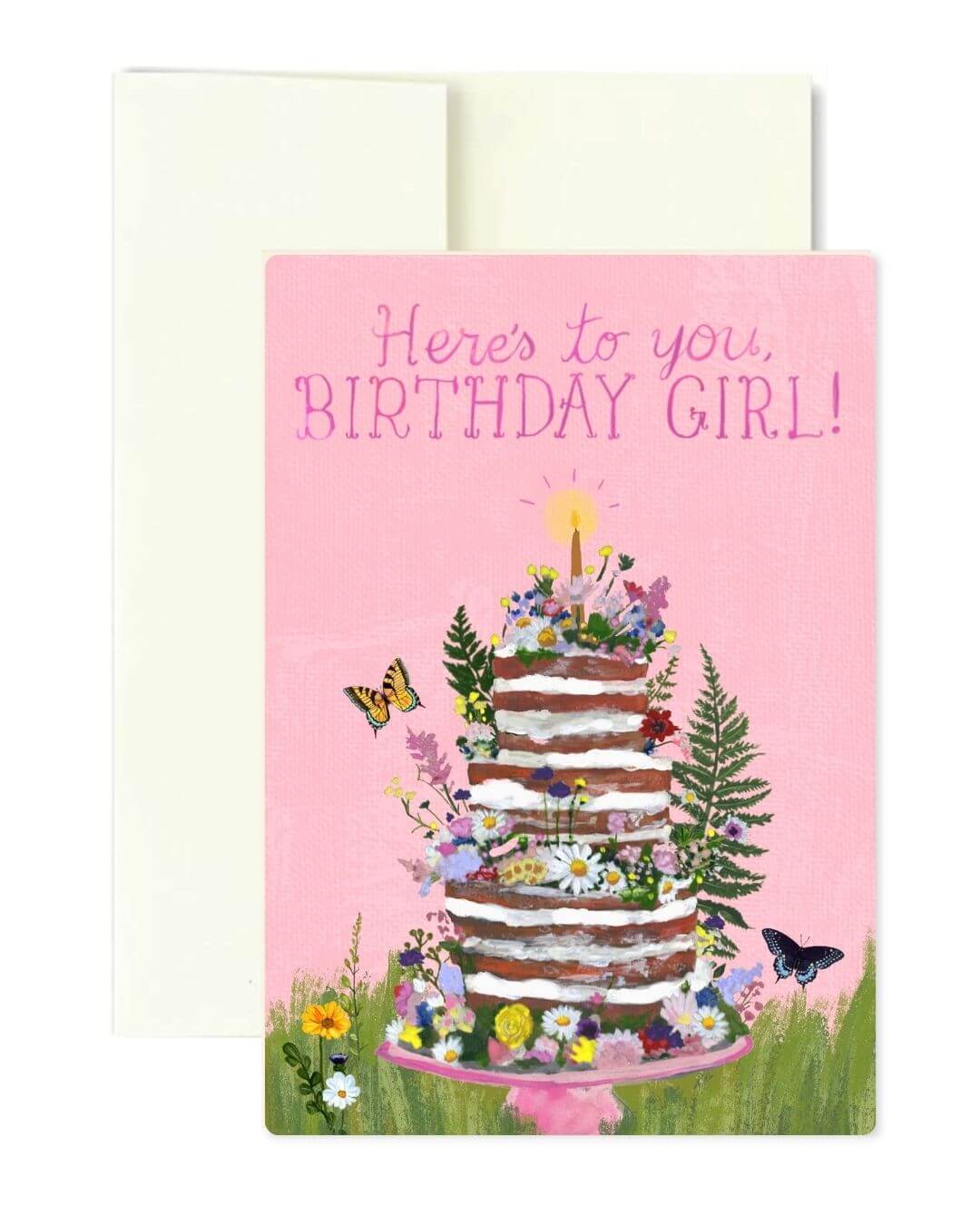 A pink birthday card with an illustrated multi-tiered cake decorated with flowers, greenery, and butterflies, with the text 'Here's to you, Birthday Girl!' at the top. A white envelope is placed behind the card on a white background.