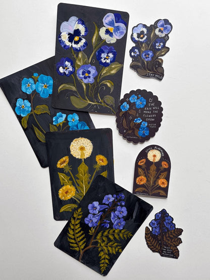 Set of black sticker cards with floral designs on a white background