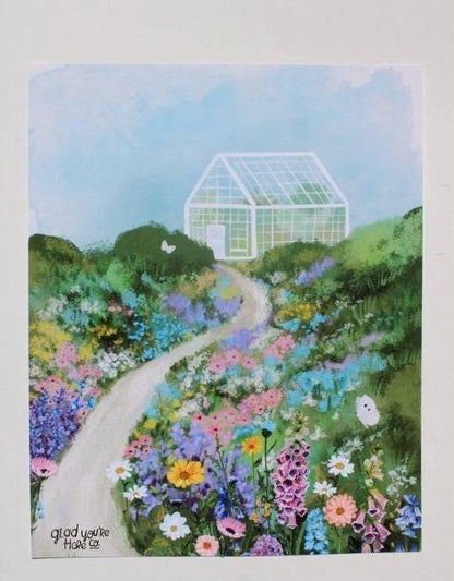 Greeting card with a colorful garden and greenhouse illustration.