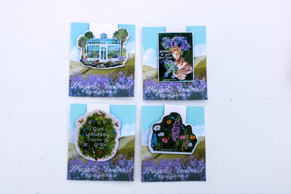 Four decorative magnets with nature-themed designs on a white background