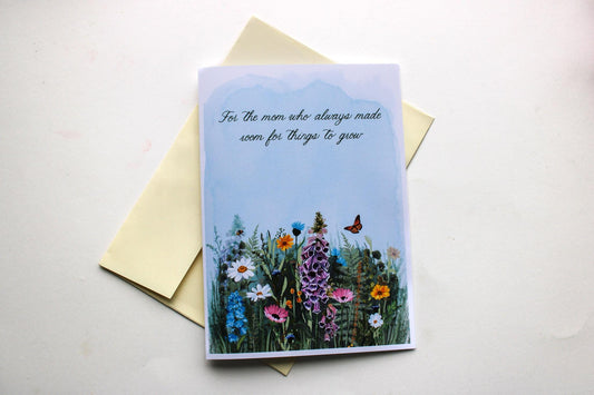 Greeting card with floral design and text on a white background