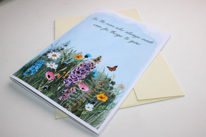 Greeting card with floral design and butterfly on a light background