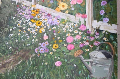 Colorful garden scene with flowers and a watering can.