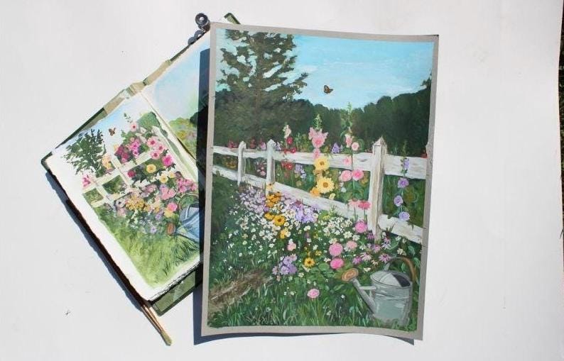 Two postcards with garden scenes featuring flowers and a white picket fence.