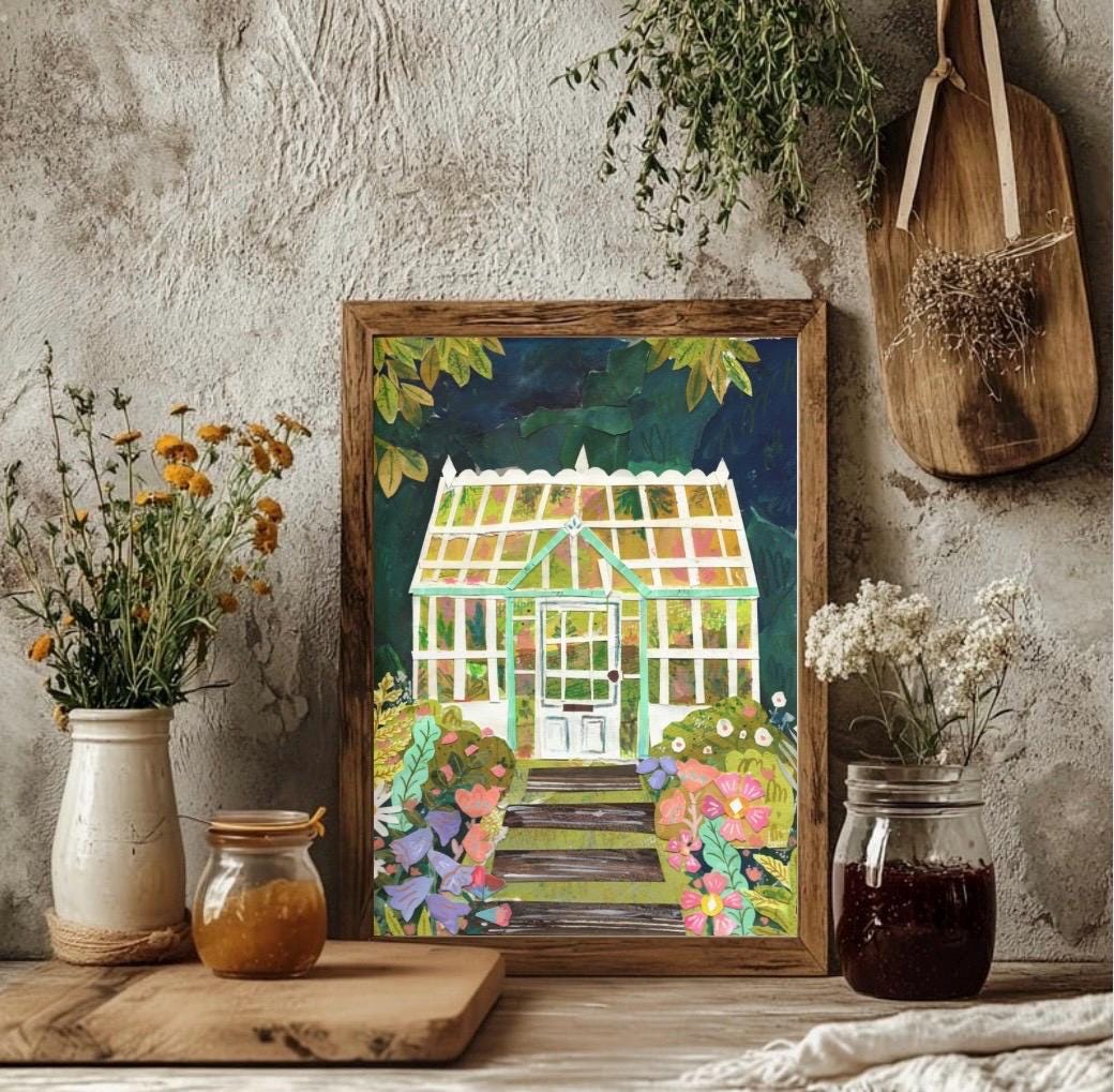 Framed artwork of a collaged colorful greenhouse on a rustic wooden surface with plants and jars.