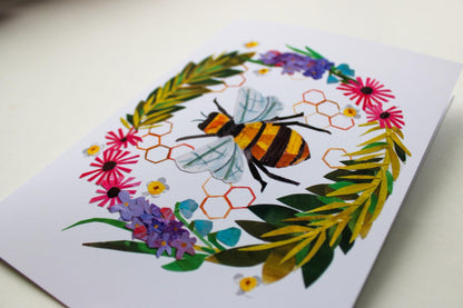 Greeting card with a bee and floral design on a white background