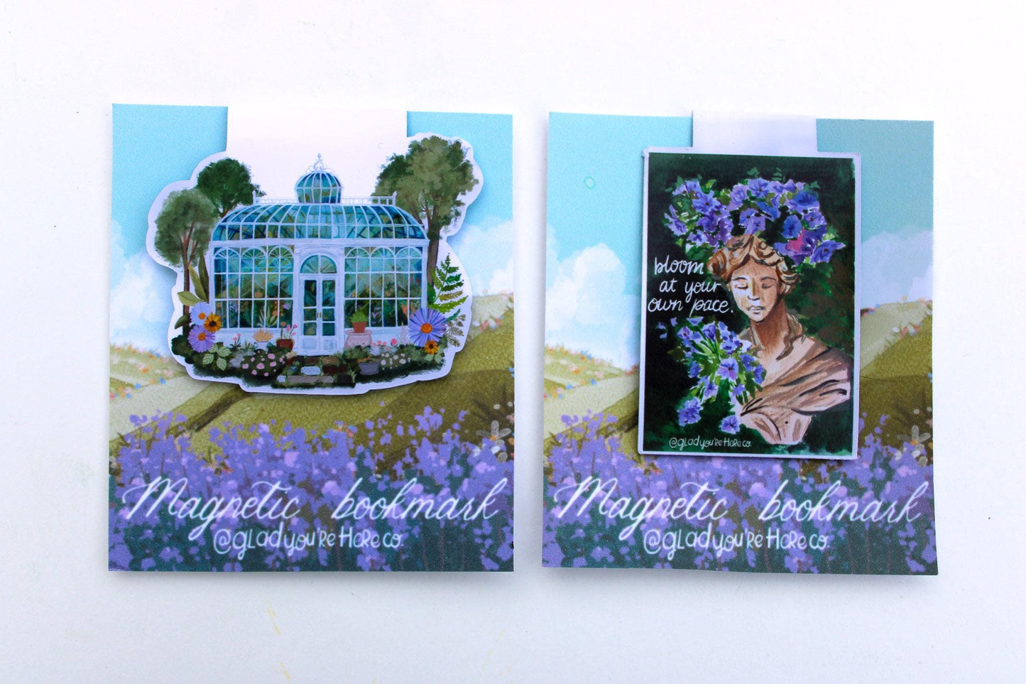 Two magnetic bookmarks with illustrations of a greenhouse and a woman with flowers, on a white background.