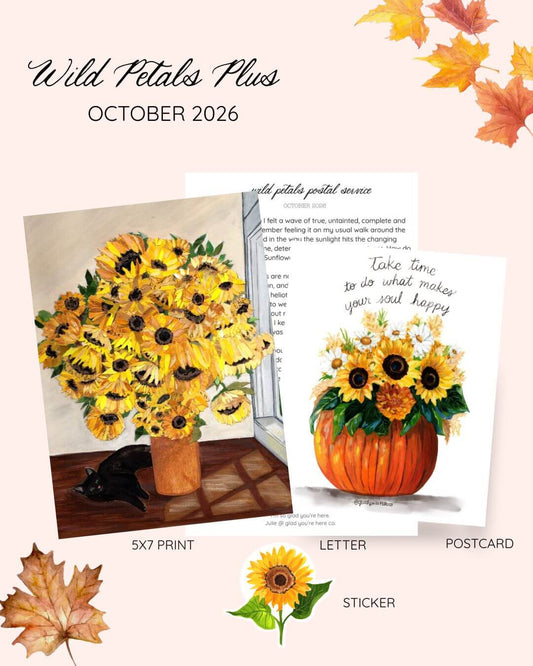A promotional collage for the Wild Petals Plus October 2026 print set, showing a 5x7 print, a letter, a postcard, and a sticker featuring sunflowers, with autumn leaves and a black cat illustration on a pale pink background.