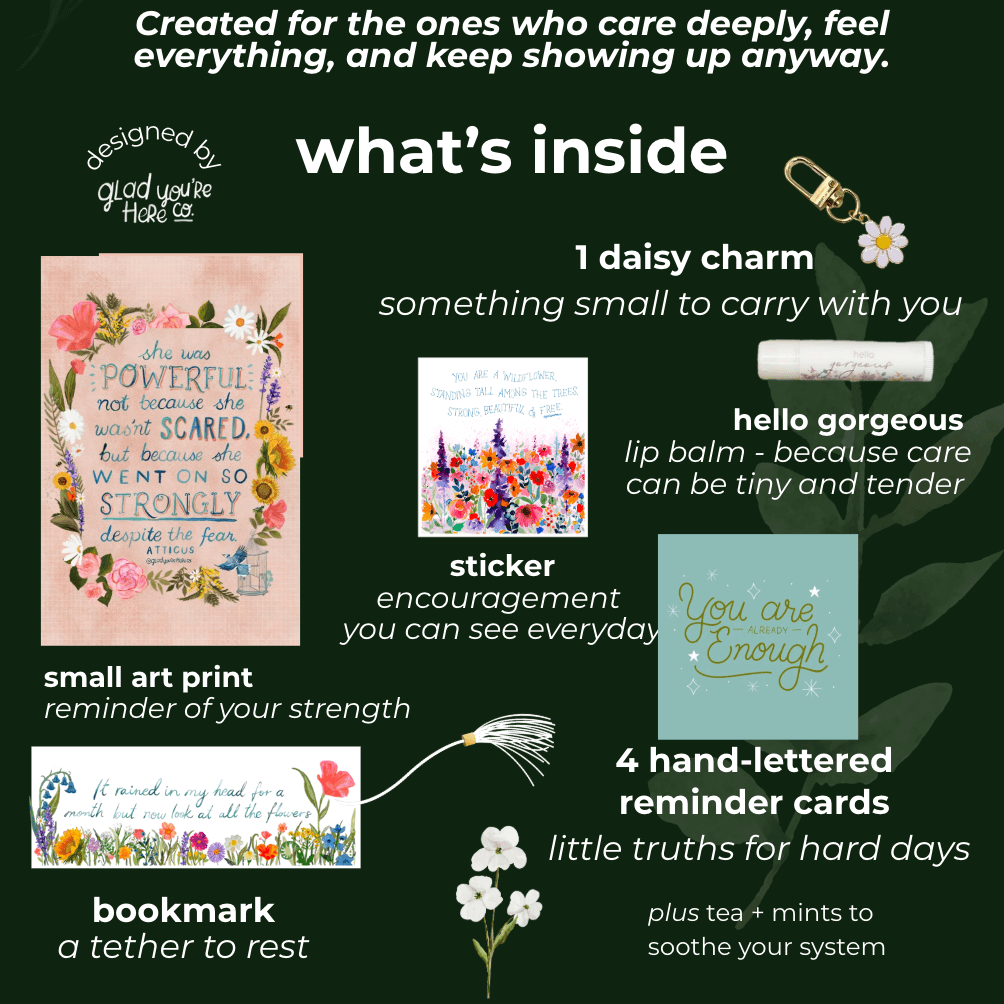 Product set with daisy charm, lip balm, art print, card, and bookmark on a black background.