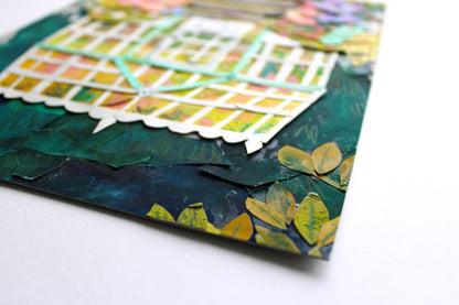 Close-up of a textured paper with colorful patterns on a white background